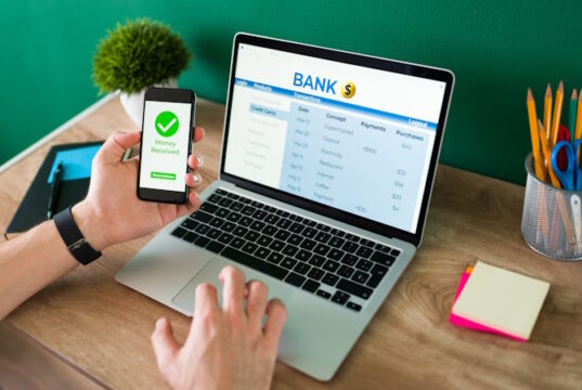 https://www.freepik.com/free-photo/wire-transfer-young-man-using-his-smartphone-laptop-banking-transaction-some-payments_27999422.htm#query=electronic%20banking&position=23&from_view=search&track=ais