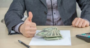 https://www.freepik.com/free-photo/young-businessman-working-from-his-office-counting-cash-money_11343026.htm#query=unclaimed%20money&position=30&from_view=search&track=ais