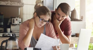 https://www.freepik.com/free-photo/young-caucasian-family-having-debt-problems-able-pay-out-their-loan-female-glasses-brunette-man-studying-paper-form-bank-while-managing-domestic-budget-together-kitchen-interior_9532842.htm#page=2&query=loan&position=1&from_view=search&track=sph