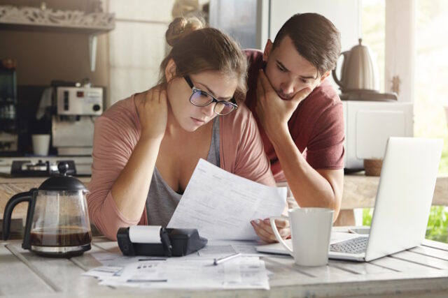 https://www.freepik.com/free-photo/young-caucasian-family-having-debt-problems-able-pay-out-their-loan-female-glasses-brunette-man-studying-paper-form-bank-while-managing-domestic-budget-together-kitchen-interior_9532842.htm#page=2&query=loan&position=1&from_view=search&track=sph