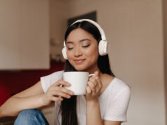 https://www.freepik.com/free-photo/attractive-asian-woman-headphones-inhale-aroma-tea-holding-cup-smiling_13400291.htm#query=coffee%20and%20music&position=30&from_view=search&track=country_rows_v1