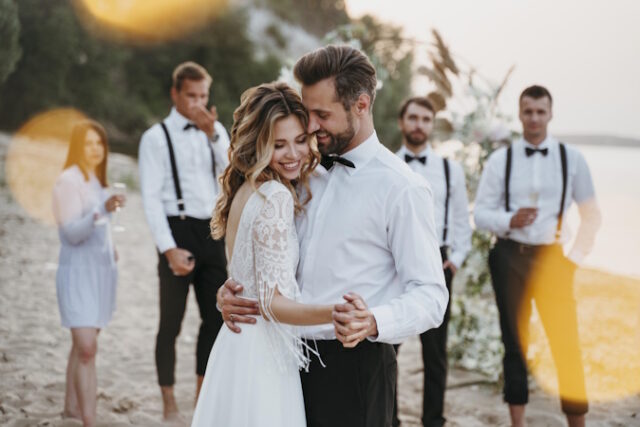 https://www.freepik.com/free-photo/beautiful-bride-groom-having-their-wedding-with-guests-beach_16516254.htm#query=wedding&position=49&from_view=search&track=sph