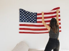 https://www.freepik.com/free-photo/female-hanging-national-flag-wall_4502530.htm#page=2&query=flagmaker&position=41&from_view=search&track=ais