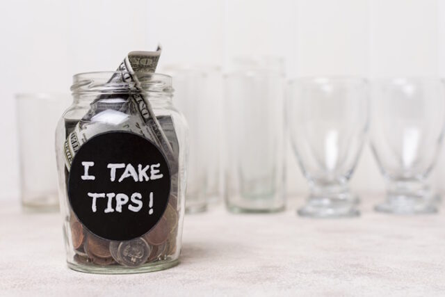 https://www.freepik.com/free-photo/glass-filled-with-money-empty-glasses-background_5683038.htm#query=tip%20money&position=2&from_view=search&track=ais