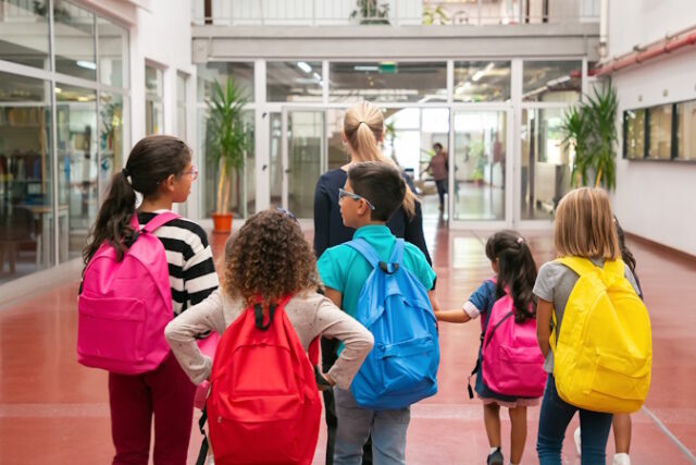 https://www.freepik.com/free-photo/group-children-with-female-teacher-walking-school-corridor_13996170.htm#query=school%20kids&position=29&from_view=search&track=ais