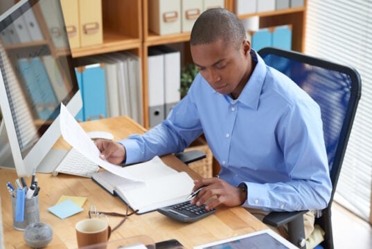 https://www.freepik.com/free-photo/high-angle-view-male-accountant-checking-financial-document_5698691.htm#query=tax%20paperwork&position=39&from_view=search&track=ais