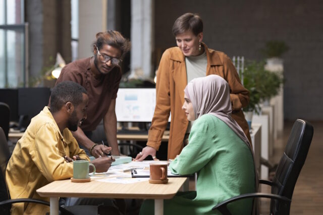 medium-shot-colleagues-having-meeting https://www.freepik.com/free-photo/medium-shot-colleagues-having-meeting_15479661.htm#query=minority%20entrepreneur&position=45&from_view=search&track=ais