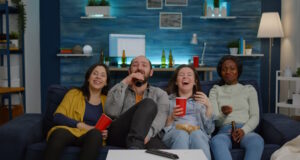 https://www.freepik.com/free-photo/multiethnic-friends-laughing-while-watching-comedy-movie-enjoying-time-spend-together-excited-mixed_15938748.htm#query=group%20tv&position=7&from_view=search&track=country_rows_v1