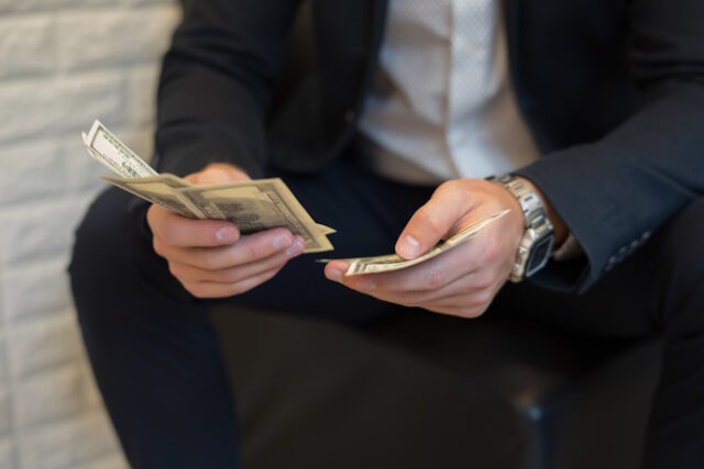 https://www.freepik.com/free-photo/portrait-businessman-holding-money-counting-it_1503106.htm#page=3&query=paying%20cash&position=41&from_view=search&track=ais
