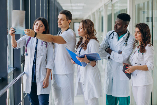 https://www.freepik.com/free-photo/team-young-specialist-doctors-standing-corridor-hospital_7869335.htm#query=medical%20school&position=12&from_view=search&track=country_rows_v1