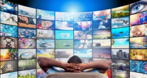 https://www.vecteezy.com/photo/20725128-man-has-fun-watching-a-film-and-relaxing-on-a-armchair-concept-of-entertainment-and-streaming-tv