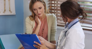 https://www.freepik.com/free-photo/woman-routine-visit-her-doctor_11982435.htm#query=woman%20checked%20by%20doctor&position=18&from_view=search&track=ais