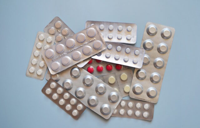 https://www.vecteezy.com/photo/24789624-a-bunch-of-pill-packs-on-a-blue-background-medication-medical-workers-day-medical-care