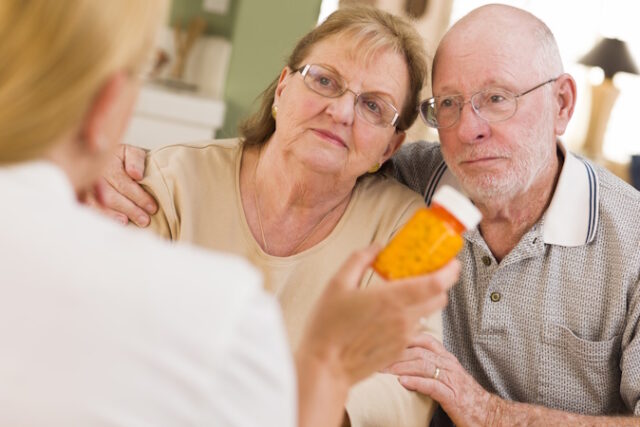 Doctor or Nurse Explaining Prescription Medicine to Attentive Senior Couple. https://www.vecteezy.com/photo/16417135-doctor-or-nurse-explaining-prescription-medicine-to-senior-couple