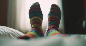 https://www.vecteezy.com/photo/24071124-intimate-close-up-of-a-woman-s-socks-in-a-bed-ai-generated