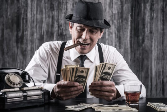 https://www.vecteezy.com/photo/13294503-money-and-power-senior-gangster-in-shirt-and-suspenders-counting-money-and-smiling-while-sitting-at-the-table