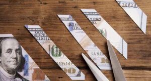 https://www.vecteezy.com/photo/16289385-one-hundred-dollar-bill-is-sliced-into-pieces-with-steel-scissors