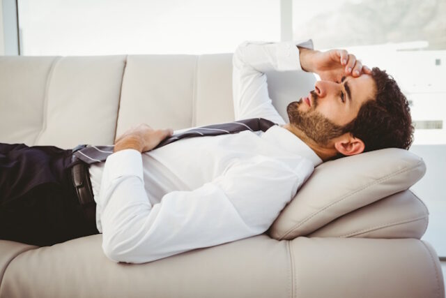 https://www.vecteezy.com/photo/832769-sick-businessman-lying-on-the-couch