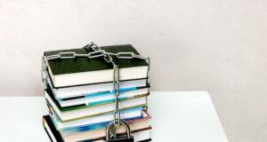 https://www.vecteezy.com/photo/23580121-stack-of-books-wrapped-in-a-chain-and-padlocked