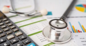 https://www.vecteezy.com/photo/2952493-stethoscope-on-calculator-finance-account-statistics-analytic-research-data-and-business-company-medical-health-concept
