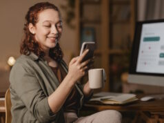 https://www.freepik.com/free-photo/woman-home-using-smartphone-front-computer-while-having-coffee_11631611.htm#query=using%20cellphone&position=23&from_view=search&track=ais