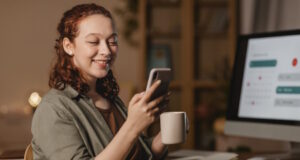 https://www.freepik.com/free-photo/woman-home-using-smartphone-front-computer-while-having-coffee_11631611.htm#query=using%20cellphone&position=23&from_view=search&track=ais