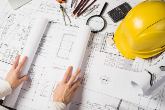 https://www.freepik.com/free-photo/crop-architect-opening-blueprint_1477063.htm#query=construction&position=2&from_view=search&track=sph