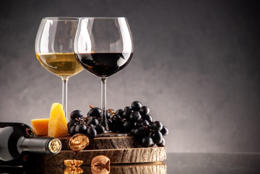 https://www.freepik.com/free-photo/front-view-wine-glasses-fresh-grapes-walnuts-yellow-cheese-wood-board-overturned-bottle-dark-background_17232192.htm#query=italian%20wines&position=18&from_view=search&track=ais