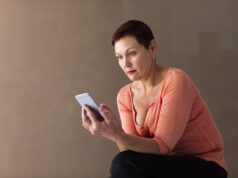 https://www.freepik.com/free-photo/pretty-senior-woman-checking-smartphone_5384908.htm#query=adult%20seriously%20reading%20smartphone&position=9&from_view=search&track=ais