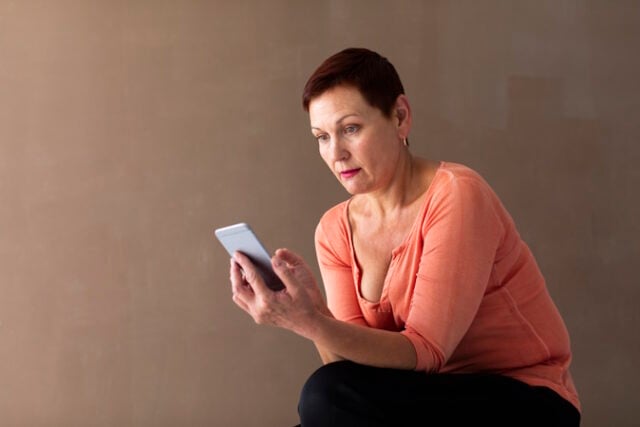 pretty-senior-woman-checking-smartphone https://www.freepik.com/free-photo/pretty-senior-woman-checking-smartphone_5384908.htm#query=adult%20seriously%20reading%20smartphone&position=9&from_view=search&track=ais
