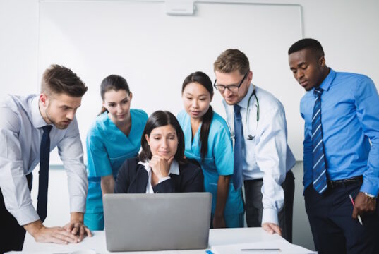 https://www.freepik.com/free-photo/team-doctor-discussing-laptop-meeting_9597296.htm#query=healthcare%20manager&position=2&from_view=search&track=ais