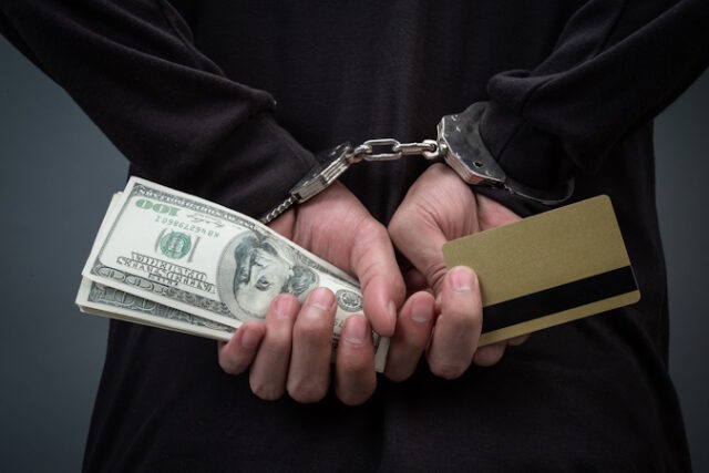 thief-wearing-black-hat-obscuring-face-was-arrested-gray https://www.freepik.com/free-photo/thief-wearing-black-hat-obscuring-face-was-arrested-gray_5219087.htm#query=id%20theft&position=36&from_view=search&track=ais