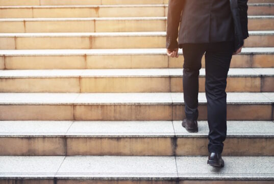https://www.vecteezy.com/photo/10585045-ambitious-businessman-going-up-staircase-back-turned