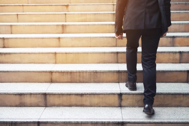 https://www.vecteezy.com/photo/10585045-ambitious-businessman-going-up-staircase-back-turned