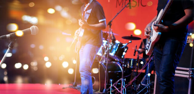 https://www.vecteezy.com/photo/6966131-guitarist-on-stage-for-background-soft-and-blur-concept