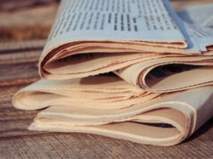 https://www.vecteezy.com/photo/22058109-newspapers-on-old-wood-background-toned-image