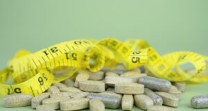 https://www.vecteezy.com/photo/30192719-sports-nutrition-supplements-natural-vitamins-and-supplements-on-a-green-background-healthy-lifestyle-concept-close-up-selective-focus
