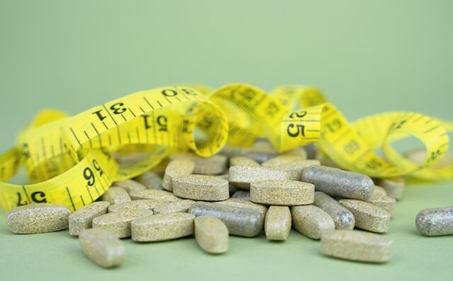 https://www.vecteezy.com/photo/30192719-sports-nutrition-supplements-natural-vitamins-and-supplements-on-a-green-background-healthy-lifestyle-concept-close-up-selective-focus