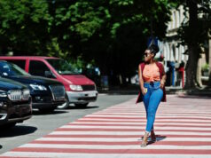 https://www.vecteezy.com/photo/10492618-stylish-african-american-woman-walking-on-crosswalk-or-pedestrian-crossing-with-mobile-phone-at-hand