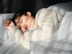https://www.vecteezy.com/photo/14325217-young-woman-sleeping-on-white-bed