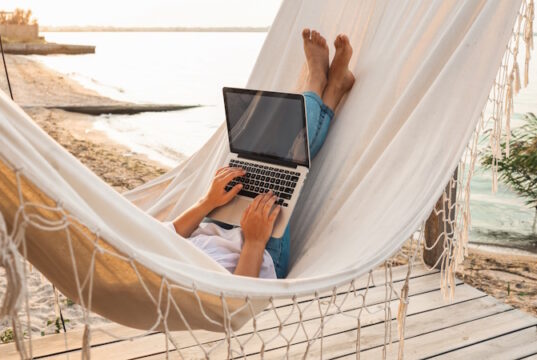https://www.freepik.com/premium-photo/young-beautiful-woman-lying-hammock-with-laptop-resort-mock-up-blank-white-screen_19773636.htm#query=work%20from%20beach&position=37&from_view=search&track=ais