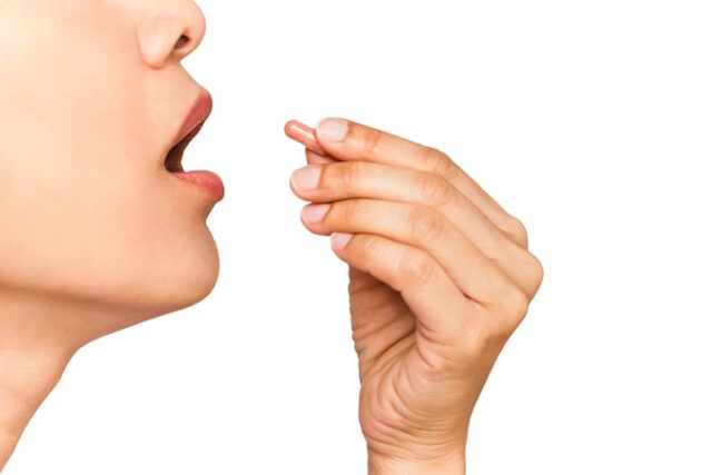 close up image of woman with her mouth open taking vitamin capsu https://www.vecteezy.com/photo/7973152-close-up-image-of-woman-with-her-mouth-open-taking-vitamin-capsule-isolate-in-white-background