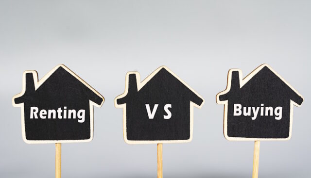Renting vs buying text on wooden house. Property investment concept. https://www.vecteezy.com/photo/7313714-renting-vs-buying-text-on-wooden-house-property-investment-concept