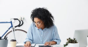 https://www.freepik.com/free-photo/attractive-confident-young-businesswoman-with-curly-hairstyle-using-calculator_10273117.htm#query=checking%20budget&position=4&from_view=search&track=ais&uuid=6b8f9d86-d983-4937-b7e0-527eb9ee789c