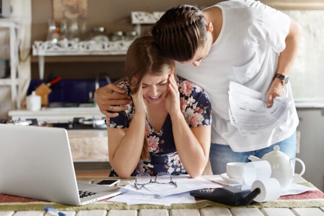 People, family troubles concept. Unhappy young woman being in bad mood, looks desperately down, faces some problems with preparing business documents, her best friend tries to help and encourage https://www.freepik.com/free-photo/couple-managing-budget-together-kitchen_9617087.htm#query=death%20and%20debt&position=38&from_view=search&track=ais&uuid=06b672ef-ee9b-4a50-b2a2-73f9c932ed92