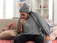 https://www.freepik.com/free-photo/sick-young-caucasian-man-optical-glasses-wearing-winter-hat-coughing-keeping-fist-close-mouth-sitting-couch-living-room_15253517.htm#query=person%20coughing&position=13&from_view=search&track=ais&uuid=73a78ae2-de26-445f-ae1c-d4fcccc50947