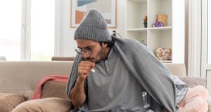 https://www.freepik.com/free-photo/sick-young-caucasian-man-optical-glasses-wearing-winter-hat-coughing-keeping-fist-close-mouth-sitting-couch-living-room_15253517.htm#query=person%20coughing&position=13&from_view=search&track=ais&uuid=73a78ae2-de26-445f-ae1c-d4fcccc50947