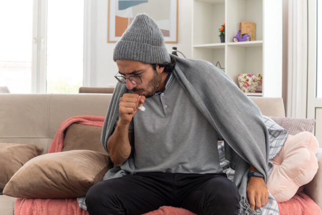 https://www.freepik.com/free-photo/sick-young-caucasian-man-optical-glasses-wearing-winter-hat-coughing-keeping-fist-close-mouth-sitting-couch-living-room_15253517.htm#query=person%20coughing&position=13&from_view=search&track=ais&uuid=73a78ae2-de26-445f-ae1c-d4fcccc50947
