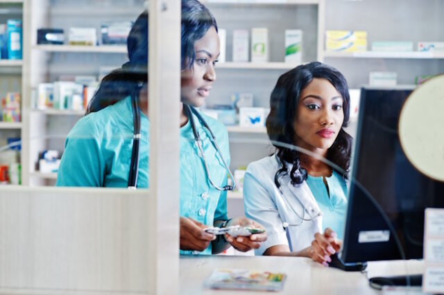 Two african american pharmacist working in drugstore at hospital https://www.freepik.com/free-photo/two-african-american-pharmacist-working-drugstore-hospital-pharmacy-african-healthcare_26075676.htm#query=pharmacy%20workers&position=12&from_view=search&track=ais&uuid=751f28f4-ca3e-4c96-b0a8-35ae6eb6eaed