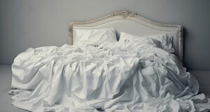 https://www.vecteezy.com/photo/30646912-a-bed-with-white-sheets-and-a-pillow-on-it